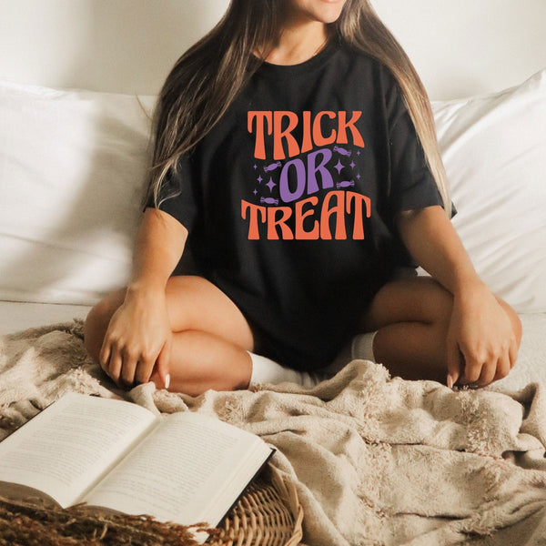 Trick or treat on Gildan women black t-shirt