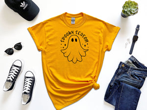 Spooky season ghost chilling on Gildan gold t-shirt