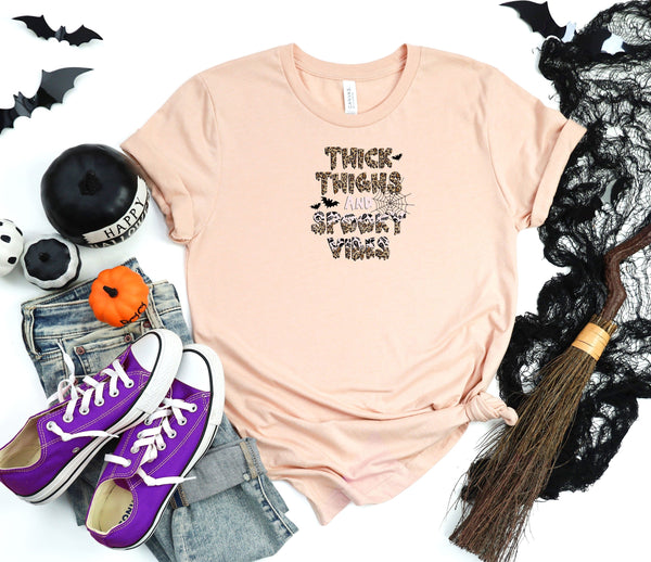 Thick things and spooky vibes lite pink t-shirt